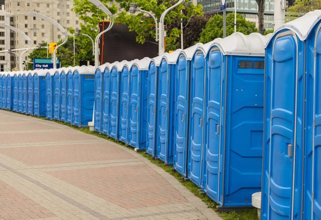 a row of portable restrooms at a fairground, offering visitors a clean and hassle-free experience in hobbs