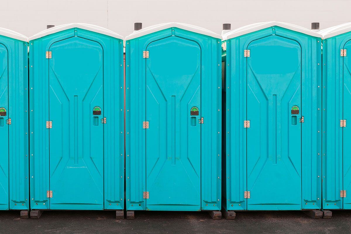 Industrial portable restroom units at a plant in Albuquerque, New Mexico